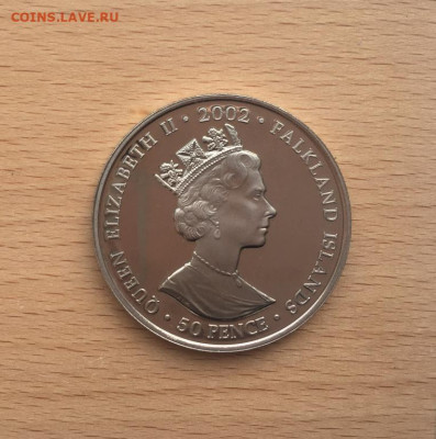 Шайба Фолклендские острова 50 пенсов 2002 Игры Содружества - krona_shajba_folklendskie_ostrova_50_pensov_2002_50_let_pravleniju_elizavety_igry_sodruzhestva_sport (1)
