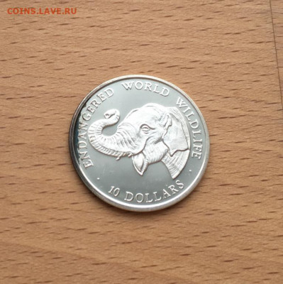 КПД Острова Кука 10$ долларов 1990 Слон Вымирающие виды Фаун - kpd_ostrova_kuka_10_dollarov_1990_slon_vymirajushchie_vidy_fauna_konvert_marka_zhivotnye_serebro (2)
