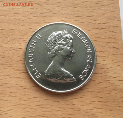 Крона Шайба Соломоновы Острова 1 доллар 1984 Олимпийские Игр - krona_shajba_solomonovy_ostrova_1_dollar_1984_olimpijskie_igry_los_andzheles_sport_olimpiada_atletika (1)