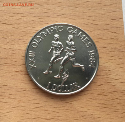 Крона Шайба Соломоновы Острова 1 доллар 1984 Олимпийские Игр - krona_shajba_solomonovy_ostrova_1_dollar_1984_olimpijskie_igry_los_andzheles_sport_olimpiada_atletika