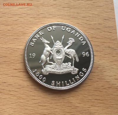Крона Шайба Уганда 1000 шиллингов 1996 100 лет Олимпийским - krona_shajba_uganda_1000_shillingov_1996_100_let_olimpijskim_igram_mekhiko_1968_olimpiada_sport_marka (1)