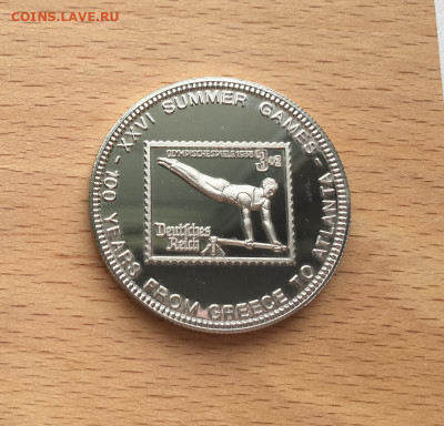 Крона Шайба Уганда 1000 шиллингов 1996 Берлин 1936 - krona_shajba_uganda_1000_shillingov_1996_100_let_olimpijskim_igram_berlin_1936_olimpiada_sport_marka
