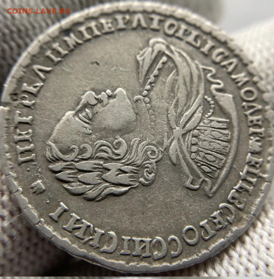 Полтина Петра 1 , 1722 год перегравировка - 84BE4B43-31A3-4F81-BC31-AA321CF0E61C