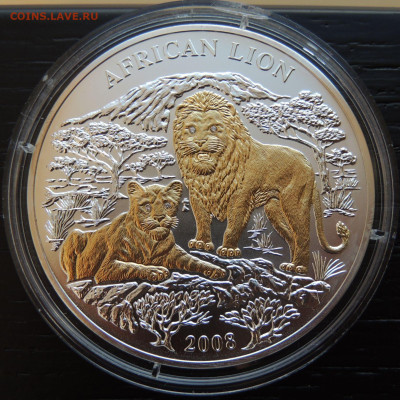 Руанда 1000 франков    2 монеты: Африканский лев и Год тигра - DSCN1131.JPG