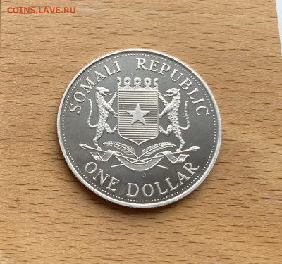 Крона Сомали 1 доллар 2004 Олимпийские Игры Стрельба из лука - krona_somali_1_dollar_2004_olimpijskie_igry_afiny_strelba_iz_luka_pruf_serebro_sport_olimpiada (3)