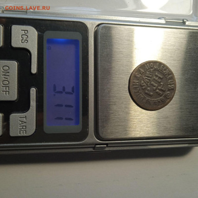 Определение подлинности деньги 1706 года - 1