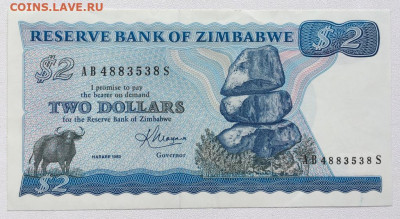 Зимбабве 2$ доллара 1983 Балансирующие камни Чиремба Животны - zimbabve_2_dollara_1983_balansirujushchie_kamni_chiremba_zhivotnye_fauna_bujvol_ryba_unc_anc_press