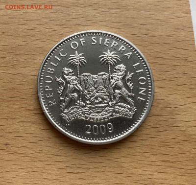 Крона Шайба Сьерра-Леоне доллар 2009 Олимпийские Игры фауна - krona_shajba_serra_leone_1_dollar_2009_olimpijskie_igry_vankuver_2010_zhivotnye_fauna_ptica_olimpiada (1)
