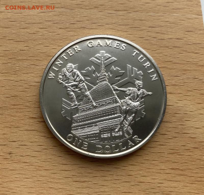 Крона Шайба Острова Кука 1$ доллар 2005 Олимпиада Турин - krona_shajba_ostrova_kuka_1_dollar_2005_olimpijskie_igry_turin_2006_khokkej_figurnoe_katanie_sport