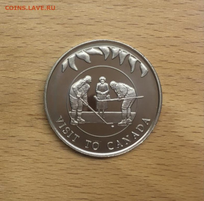 Шайба Фолклендские острова 50 пенсов 2002 50 лет правлению - krona_shajba_folklendskie_ostrova_50_pensov_2002_50_let_pravleniju_elizavety_khokkej_sport_vizit_kanada