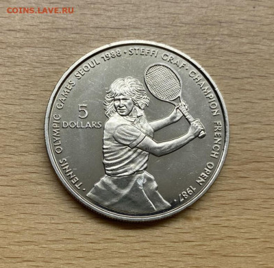 Крона Шайба Ниуэ 5$ долларов 1987 Штеффи Граф - krona_shajba_niue_5_dollarov_1987_olimpijskie_igry_seul_1988_tennis_shteffi_graf_sport_olimpiada
