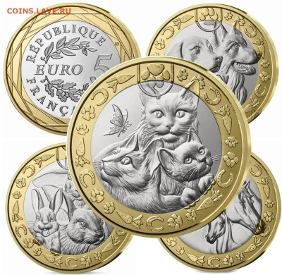 Кошки на монетах - кошки.