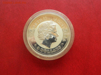 1 доллар 2008. Австралия. 155 грамм серебра. - 8_avstralijskikh_dollarov_2007_god_svini_8_uncij_serebro_155_gramm2